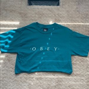 green cropped OBEY shirt